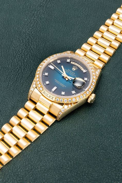 rolex president oro giallo e diamanti e malachite